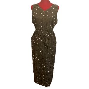 Rock the dots!!  Old navy black with white polkadots V-neck front jumpsuit large